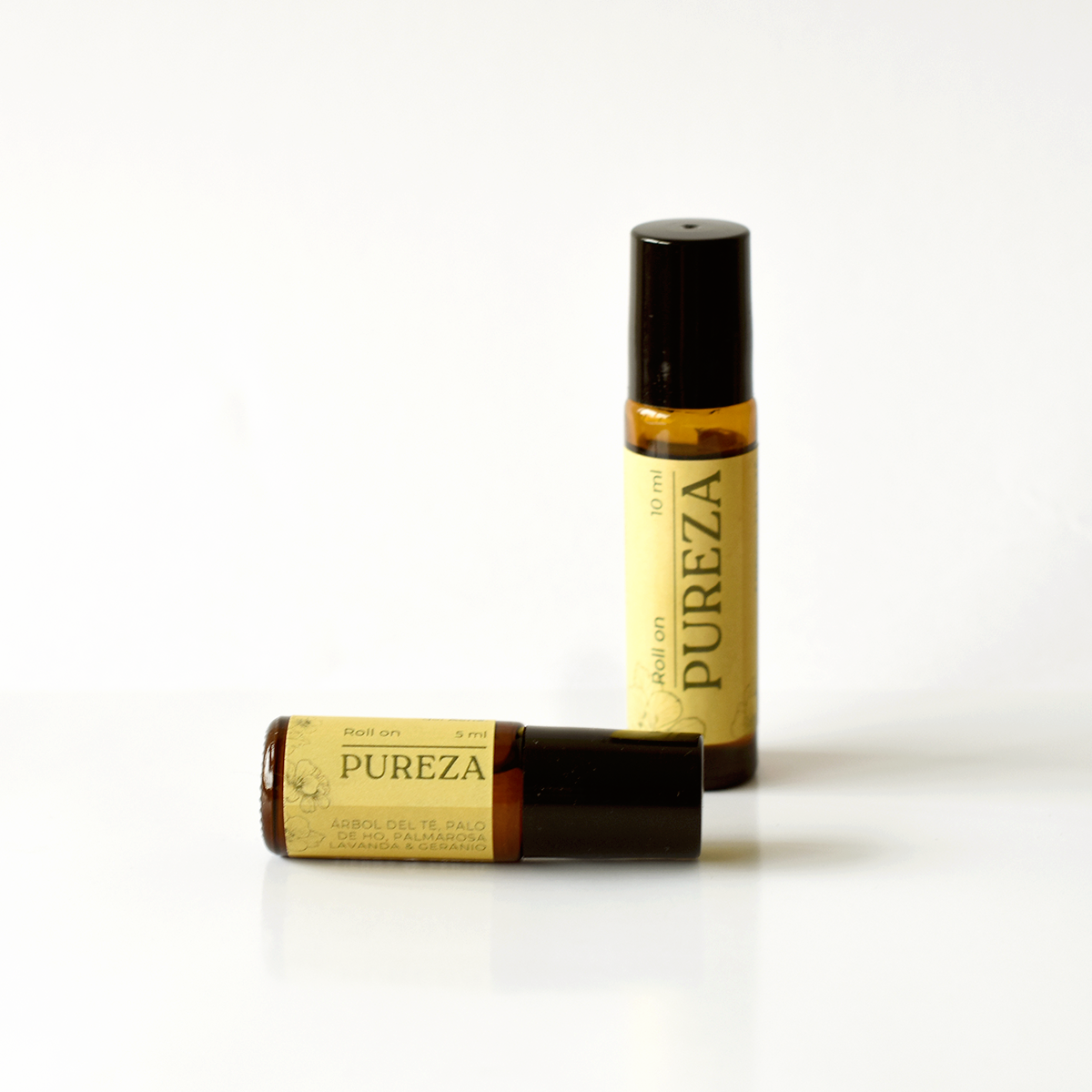 Roll on pureza de aromaterapia anti acné con árbol del té, lavanda y jojoba para piel con granitos e imperfecciones.