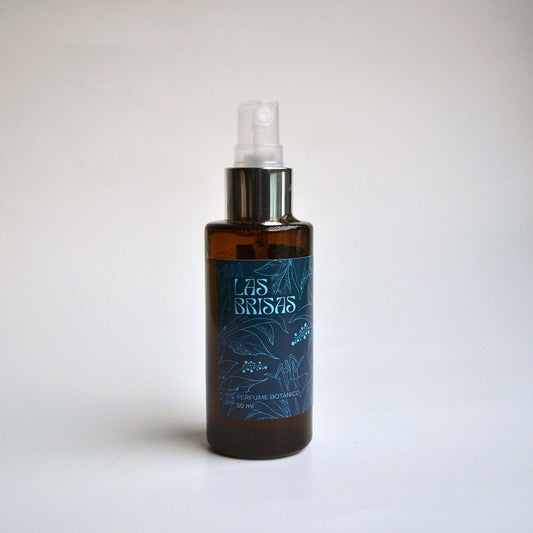 Perfume natural con aceites esenciales de ciprés, cedro y anís para energía equilibrada y aroma fresco